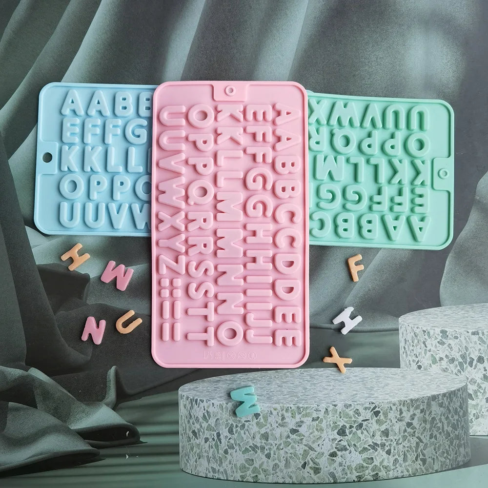A silicone mold set featuring various letters and numbers in pastel colors for baking