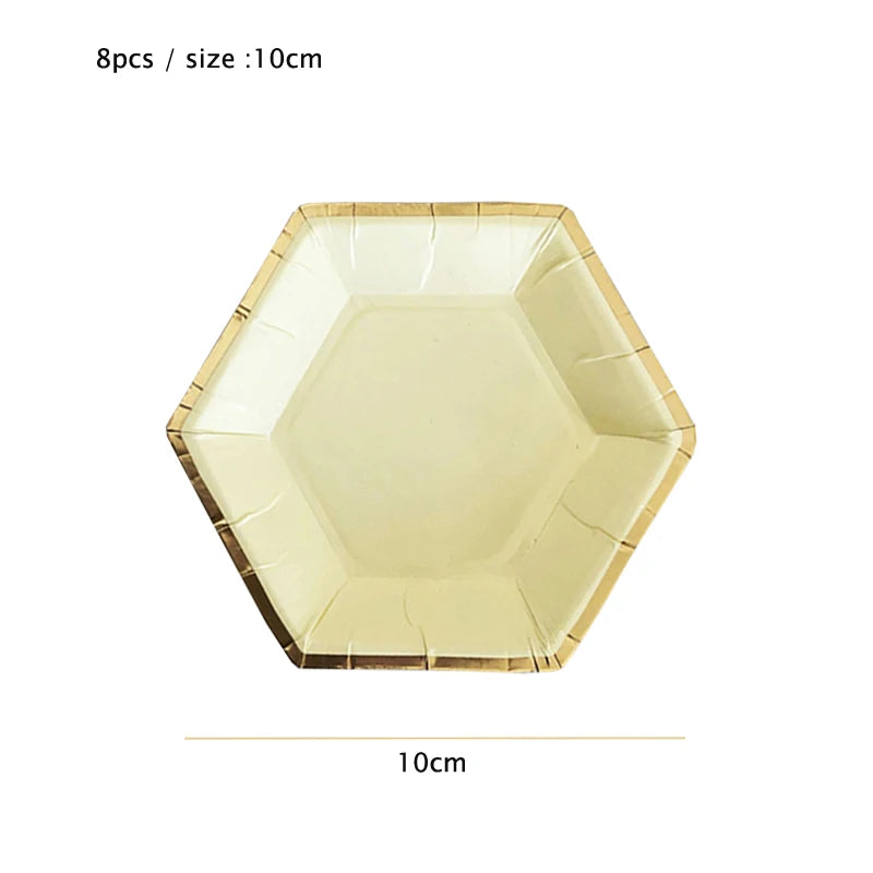 A set of eight gold disposable party plates with a hexagonal shape and a 10cm size.