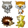 A set of three foil balloons shaped like a raccoon, fox, and bear for party decoration.
