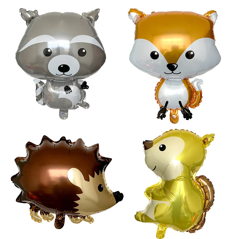 A set of three foil balloons shaped like a raccoon, fox, and bear for party decoration.