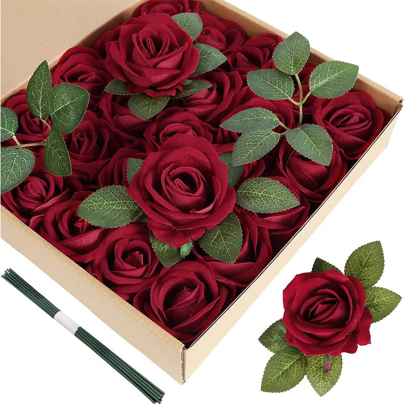 A box filled with 50 artificial deep red velvet roses on a light brown background.