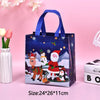 A dark blue non-woven gift tote bag with a festive Christmas print featuring Santa Claus and snow scenes.