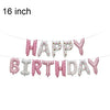 A banner made of pink and blue foil letter balloons spelling out Happy Birthday