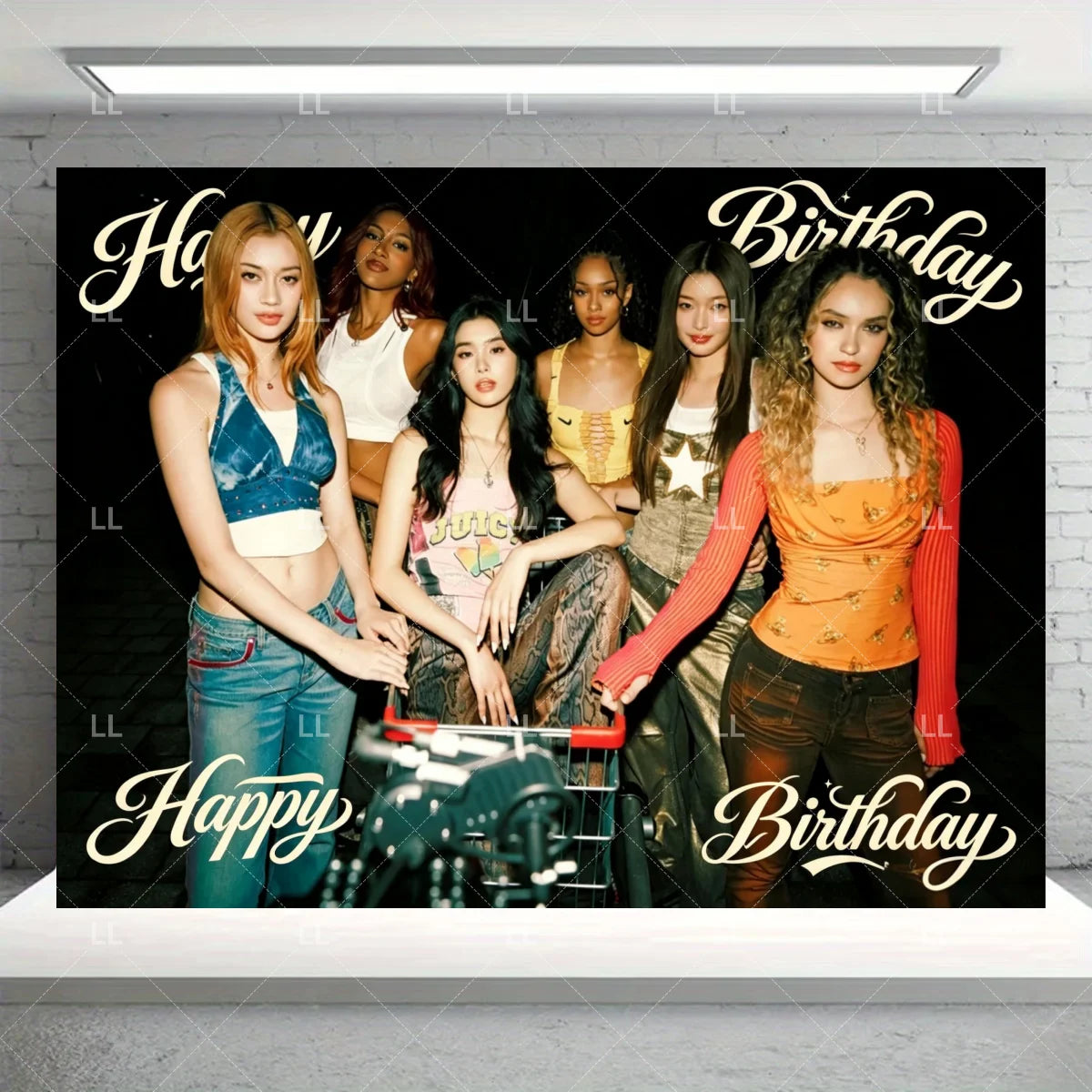 A group of five young women posing in front of a dark backdrop with gold text reading Happy Birthday