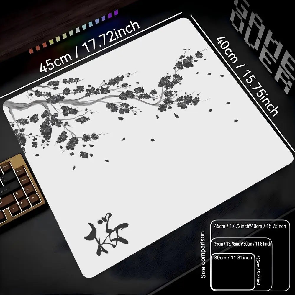 A white gaming mouse pad featuring a delicate black cherry blossom branch design on a dark surface.