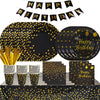Black and gold disposable dinnerware set including plates, napkins, and cups for a birthday party