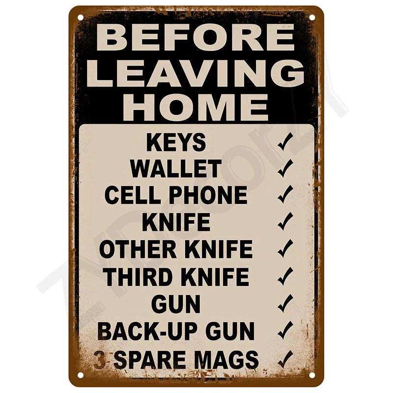 A vintage brown tin sign listing items to take before leaving home, including keys, wallet, cell phone, knives, and guns.