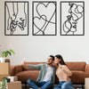Three framed black line art prints depicting hands holding, a heart, and a profile of a face.