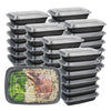 A stack of black plastic food storage containers with lids, including a single container filled with rice and grilled meat.