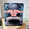A collectible figurine of Whitebeard in a sumo stance against a dark background.