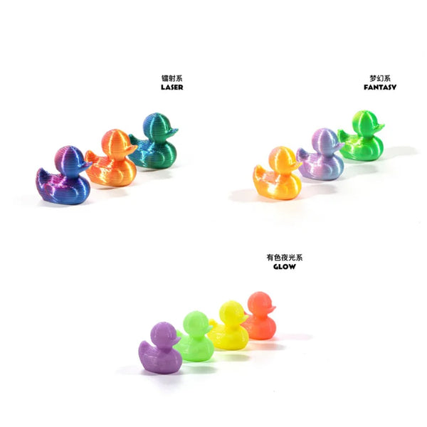 A collection of colorful 3D printed mini duck figurines in various colors like blue, orange, and green.