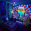 A vibrant tapestry wall art featuring a psychedelic character with large glasses and swirling colors.