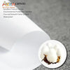 A roll of white canvas material for art, showing a close-up of the fabric texture.
