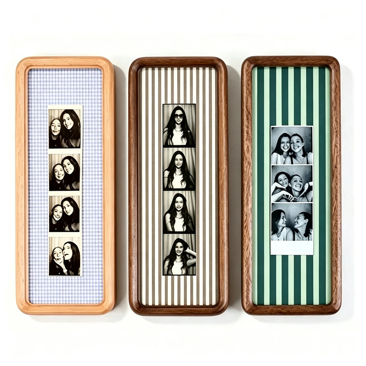 Three wooden photo strip frames with striped backgrounds displaying portraits of women.