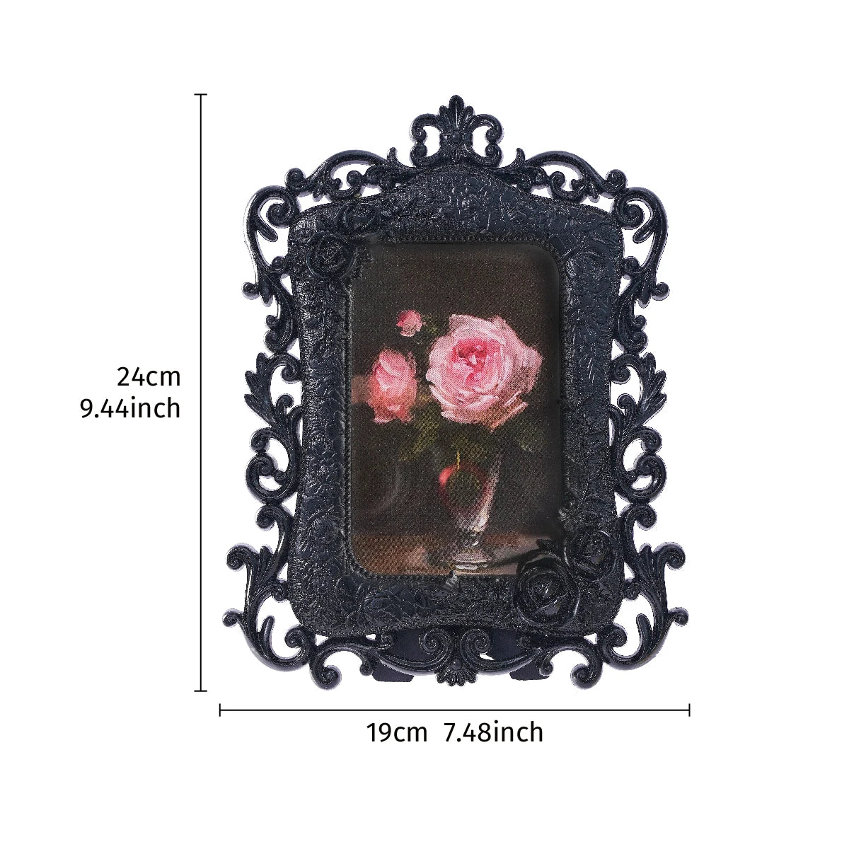 Black ornate resin photo frame with a pink rose design and dark background