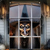 A window banner featuring a close-up of a menacing, furry monster face peering through the glass.