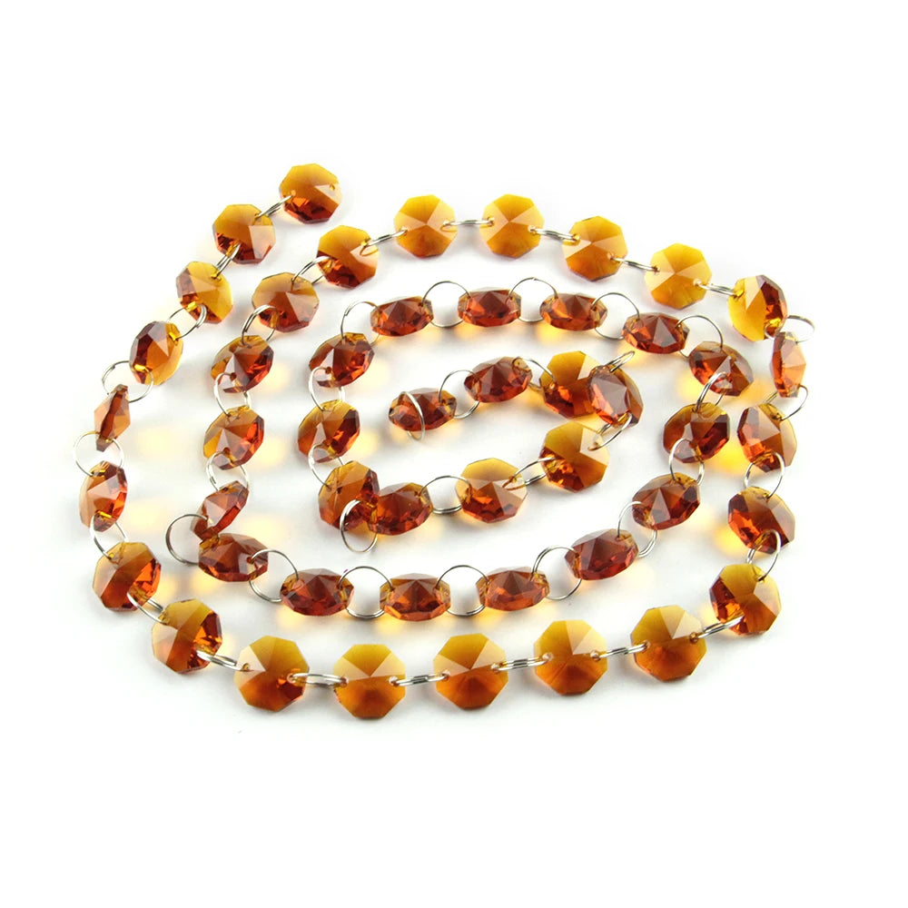 A strand of amber-colored crystal glass octagon beads used for home decor.