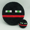 A black plush doll with white and green horizontal stripes on its face, resembling a horror game character.