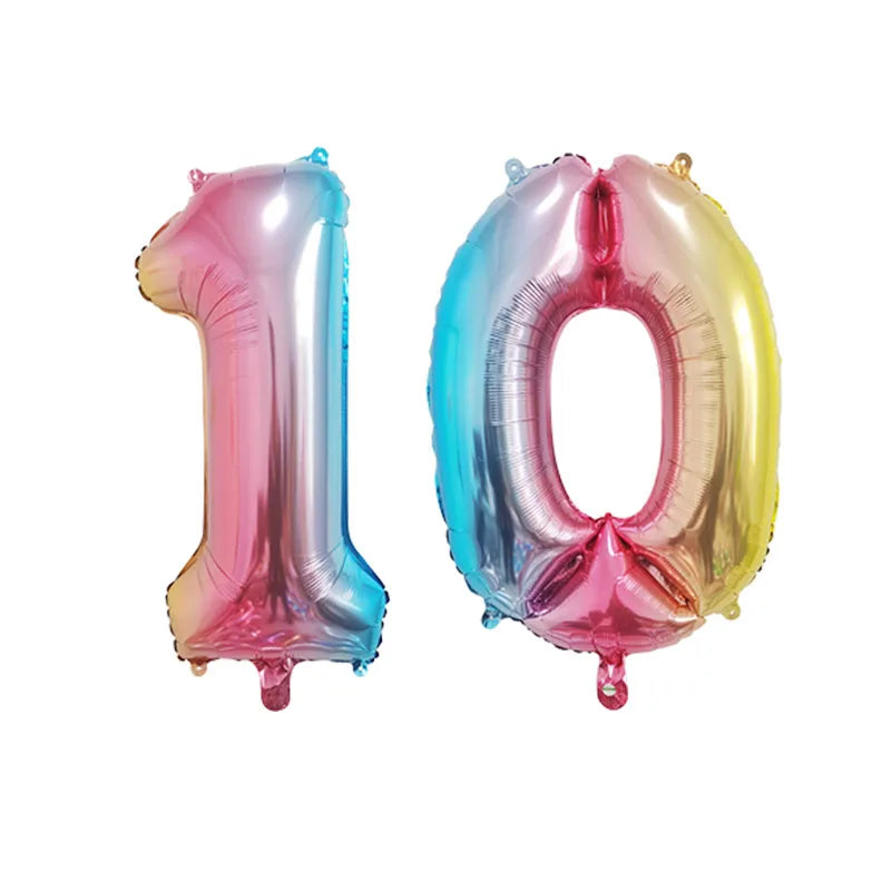 Two foil number balloons shaped like 1 and 0 in pink and blue with rose gold accents
