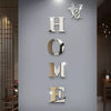 A set of self-adhesive acrylic butterfly mirror wall stickers spelling out the word HOME