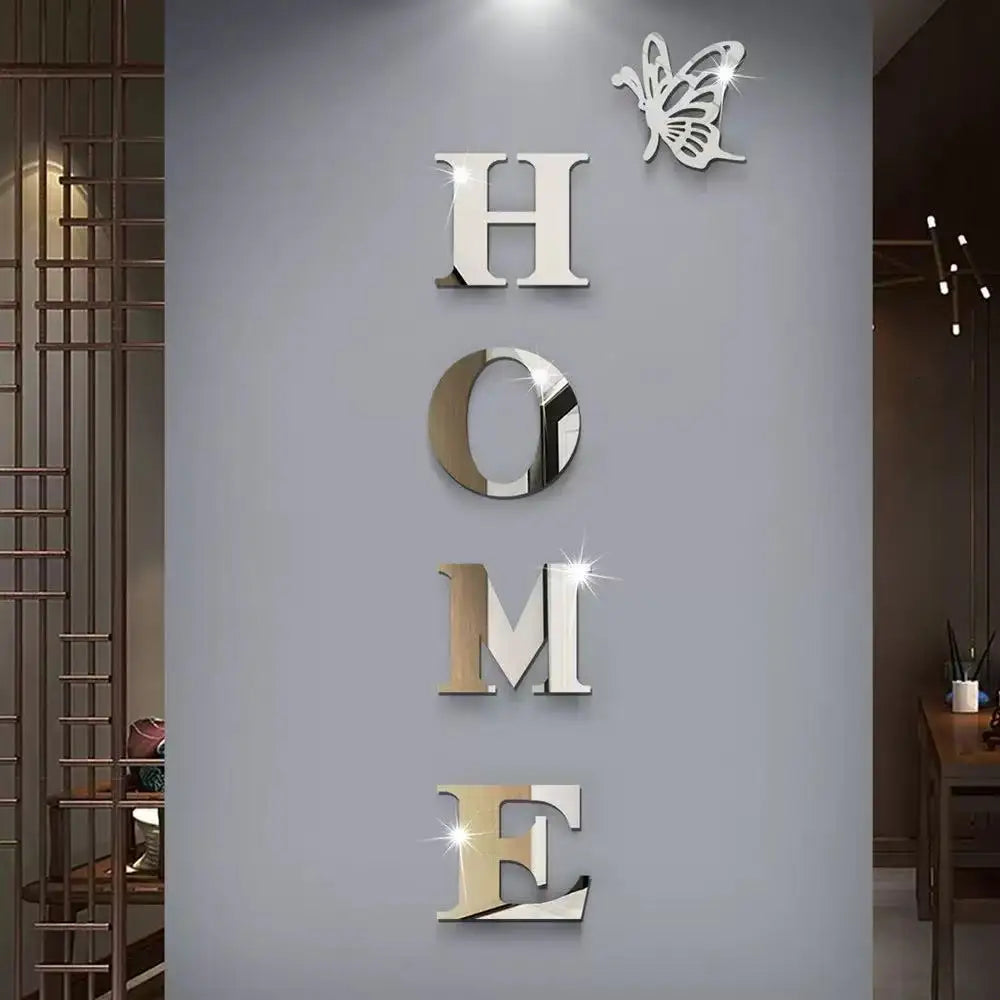 A set of self-adhesive acrylic butterfly mirror wall stickers spelling out the word HOME