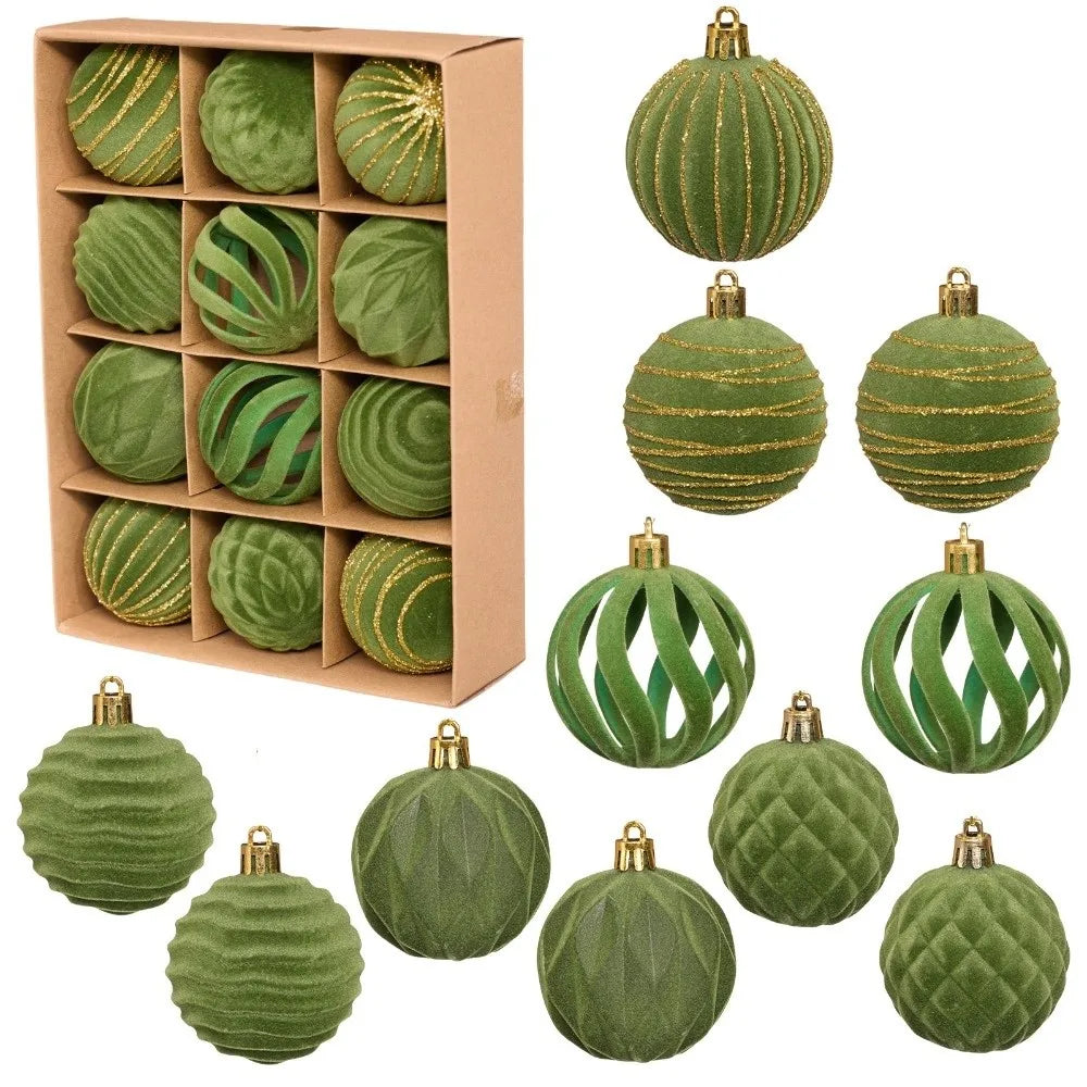 A set of twelve green velvet Christmas hanging ornaments, some striped and some solid, displayed in a cardboard box.