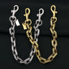 Two-tone metal chain bag pendant featuring silver and gold links.