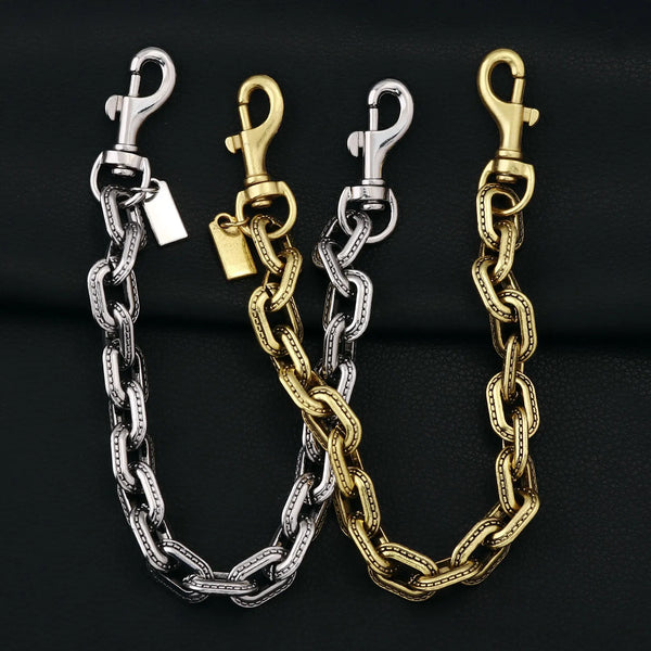 Two-tone metal chain bag pendant featuring silver and gold links.