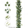 A vertical arrangement of artificial simulation vine garland featuring various leaf shapes and textures for decor.