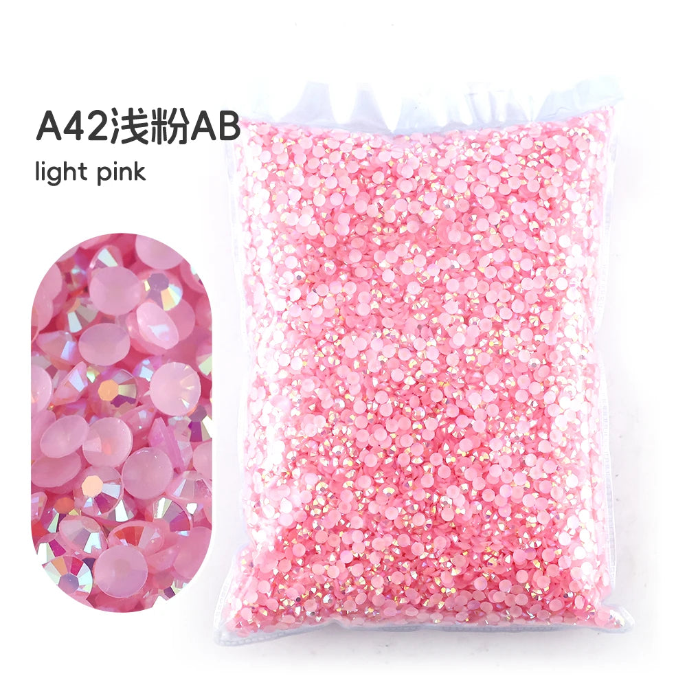 A42 glitter pink resin rhinestones in a pouch for crafting