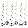 A set of five black and green wavy balloons shaped like soccer balls hanging from strings.