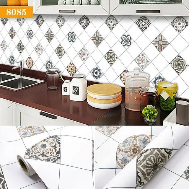 A close-up view of a waterproof oil-proof kitchen wall sticker featuring a white and gray diamond pattern on a cabinet surfac