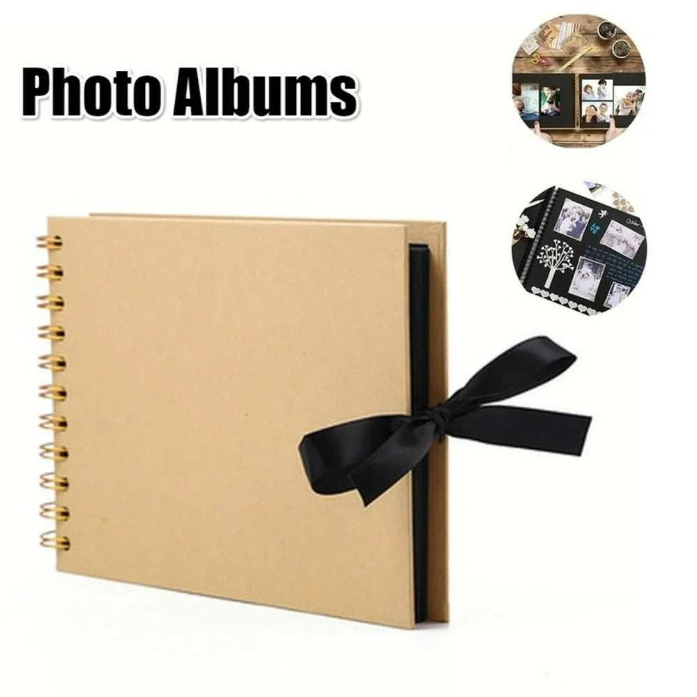 A tan photo album with a black ribbon tied on, next to examples of scrapbook layouts.