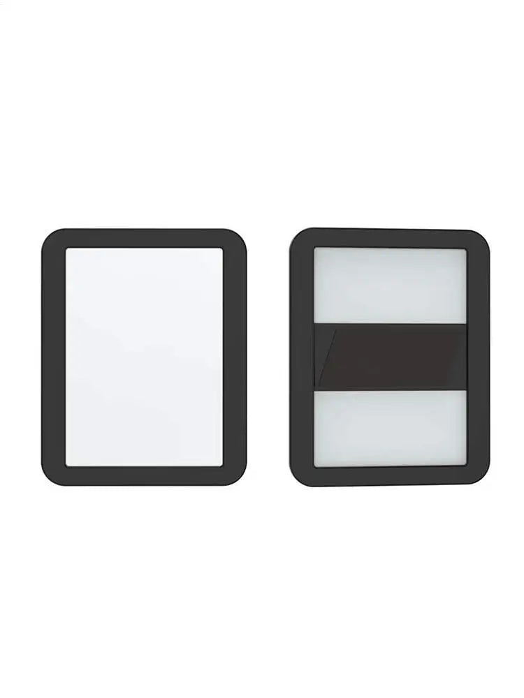 A compact magnetic locker mirror with a black frame and a reflective surface divided by a horizontal line.