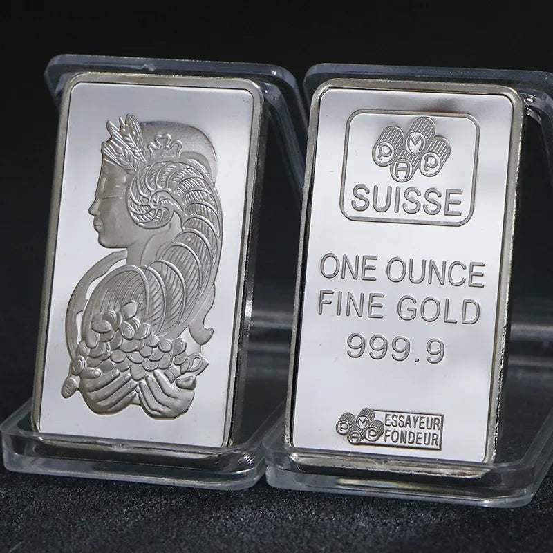 A silver bullion bar replica featuring a profile of a woman and the word SUISSE on the packaging.