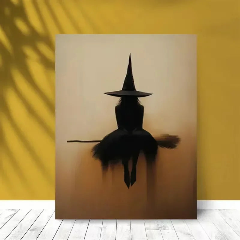 Minimalist witch silhouette wall art featuring a black witch figure with a pointed hat and broomstick on a neutral background