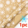 Roll of festive snowflake Christmas wrapping paper in beige color