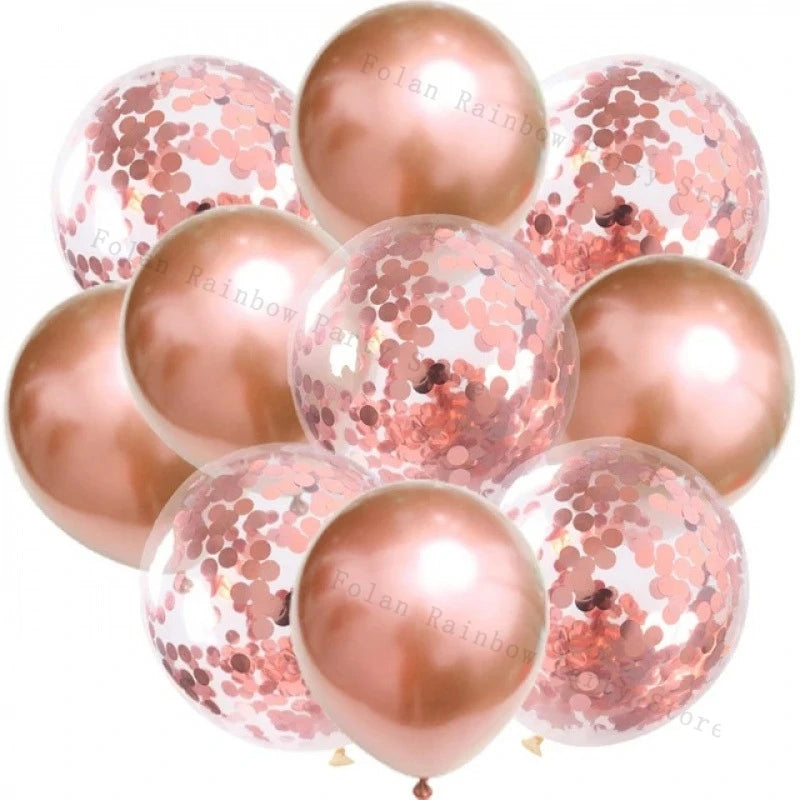 A cluster of rose gold and pink confetti balloons used for parties.