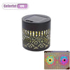 A dark wall lantern with a perforated, decorative pattern, designed for garden and patio use.