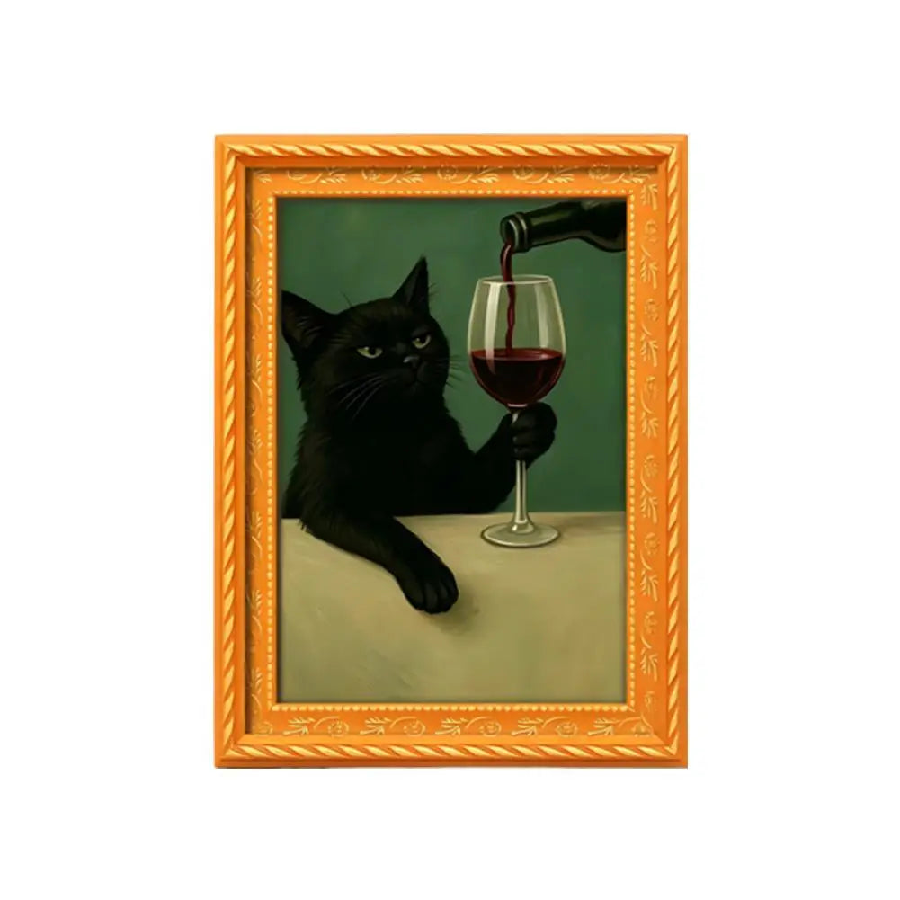 A framed painting featuring a black cat pouring red liquid into a glass, set in an orange wooden frame.