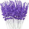 A bunch of purple artificial eucalyptus leaves used for home and party decor.