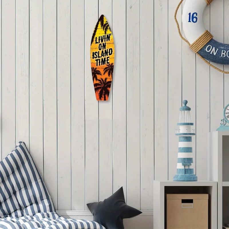 A wooden wall decor sign shaped like a surfboard with palm trees and the text LIVIN ON ISLAND TIME.