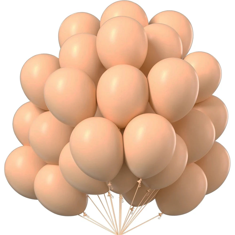 A bunch of light orange latex balloons tied together, ready for party decor.