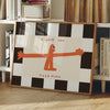 A framed wall art print featuring an orange silhouette of a person saying I love you this much on a black and white checkered