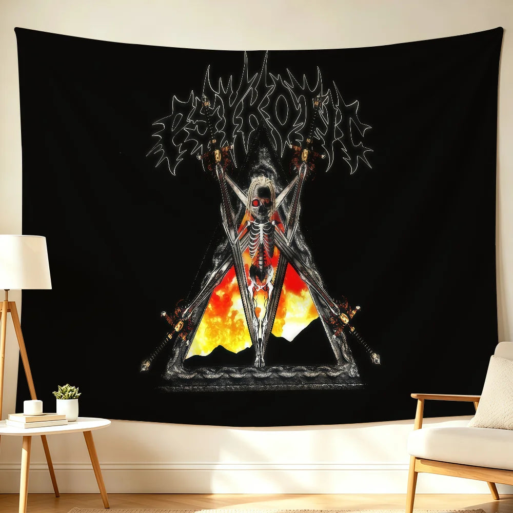 Black wall art featuring a stylized skull design with fiery elements and dark, spiky text.