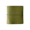 A olive green faux leather photo album with a stitched closure.