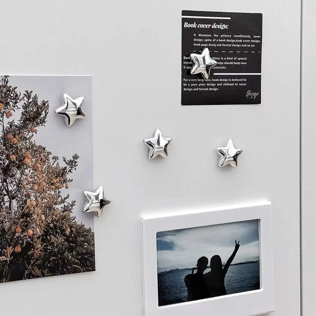 A set of decorative heart and star fridge magnets displayed on a white surface.