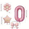 Assorted pink birthday balloons including a flower shape, a number zero, and bows.