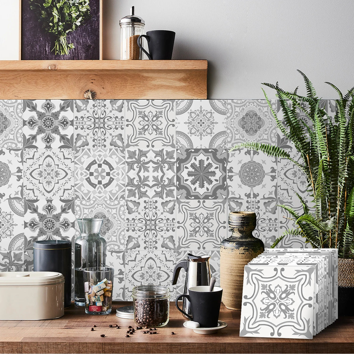 A patterned tile wall sticker design featuring intricate gray and white floral and geometric motifs on a wooden surface.