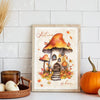 Wall art featuring an illustration of a large orange mushroom and autumn foliage on a wooden frame.